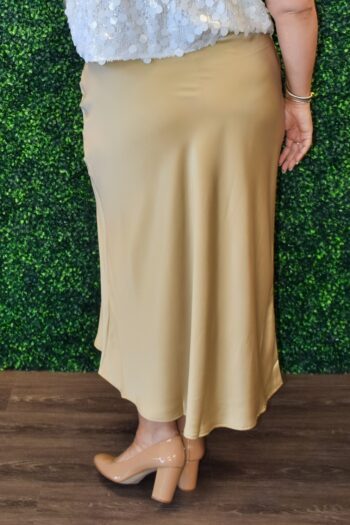 Back view of champagne satin midi skirt with soft lingerie-style waistband – curve-flattering slip skirt for plus size and midsize women.