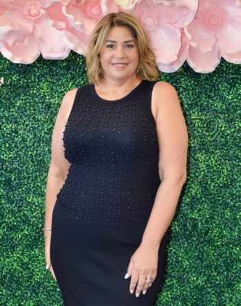 A chic sleeveless beaded knit tank top in classic black, featuring a stretch ribbed design with subtle sparkle. Perfectly tailored for plus-size and midsize women, this versatile piece offers both comfort and glam, making it ideal for layering or wearing solo.