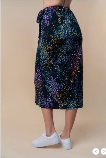 Back view of plus size mock wrap midi skirt in soft, lightweight fabric with an easy pull-on fit and comfortable elastic waist.