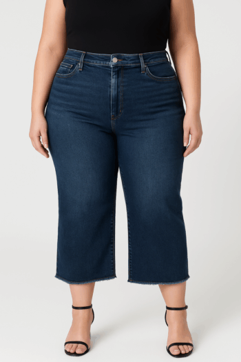 Front view of plus size RFM Chloe dark wash cropped jeans with frayed hem and high-rise fit.