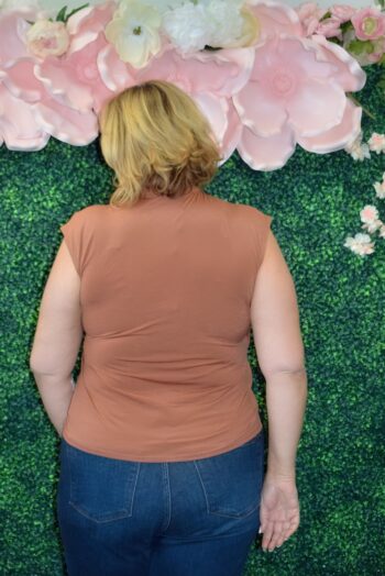 Back view of the Dear Scarlett Surplice Top in rust, showing smooth wrinkle-free fabric and comfortable fit.