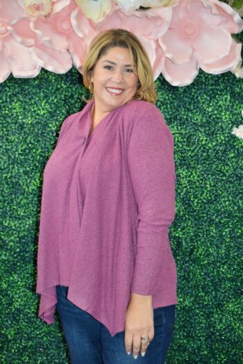 Plus-size model wearing the Dear Scarlett Button Cozy Cardigan in Mulberry Rose. Soft, lightweight, open-front cardigan with a single button closure. Available in sizes S-3X.