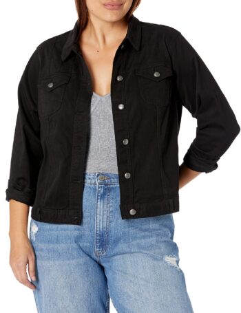 Plus size woman wearing the Skye’s the Limit Onyx black denim jacket, buttoned front with chest pockets.