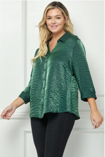 Plus-size woman wearing the Shimmer Shirt in metallic Hunter Green, featuring French cuffs and a soft crinkle texture, available in sizes S–3X at Botticelli Boutique.