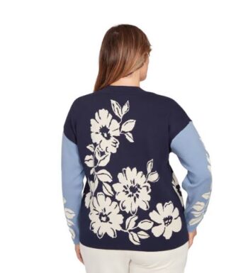 Back view of floral print navy and light blue plus size cardigan sweater with large ivory flowers, available in sizes 1X–3X.