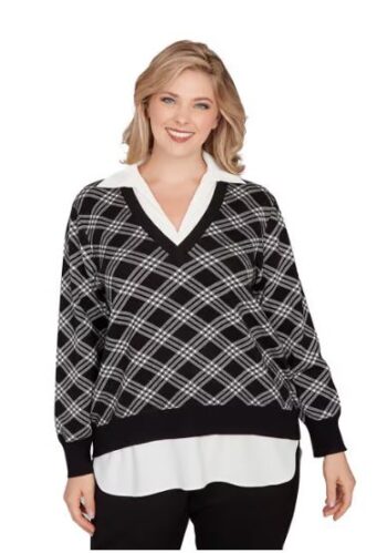 Plus size model wearing a black and white mock layered plaid sweater with v-neck and shirt-style hem, front view, sizes L-3X.