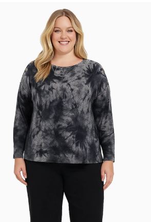 Plus size woman wearing a charcoal and grey tie-dye cozy knit top with long sleeves and shoulder button detail, front view.