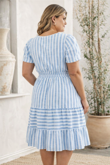 Rear view of a mid-size woman in a blue and white striped midi dress with puff sleeves, elastic waist, and tiered skirt, ideal for Newport Rhode Island wedding celebrations and coastal events.