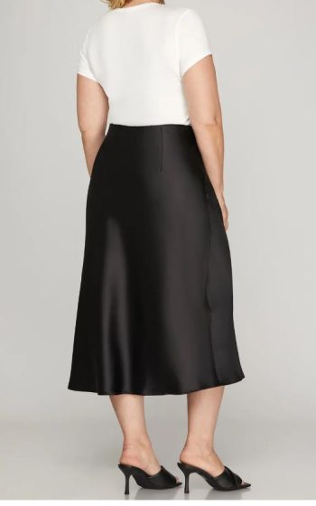 Back view of black satin midi skirt with smooth, flowing fit