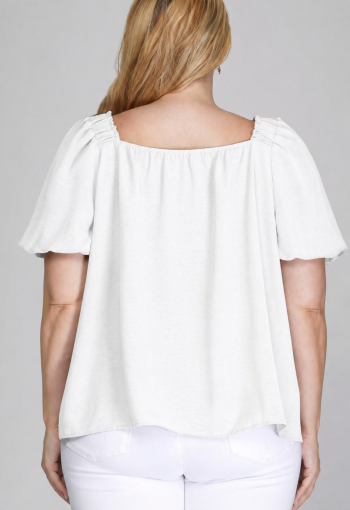 Back view of white airflow blouse with flowy fit and breathable fabric